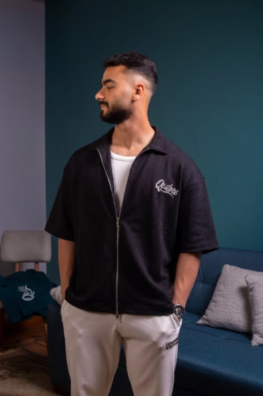 The Essential  black Zip Polo